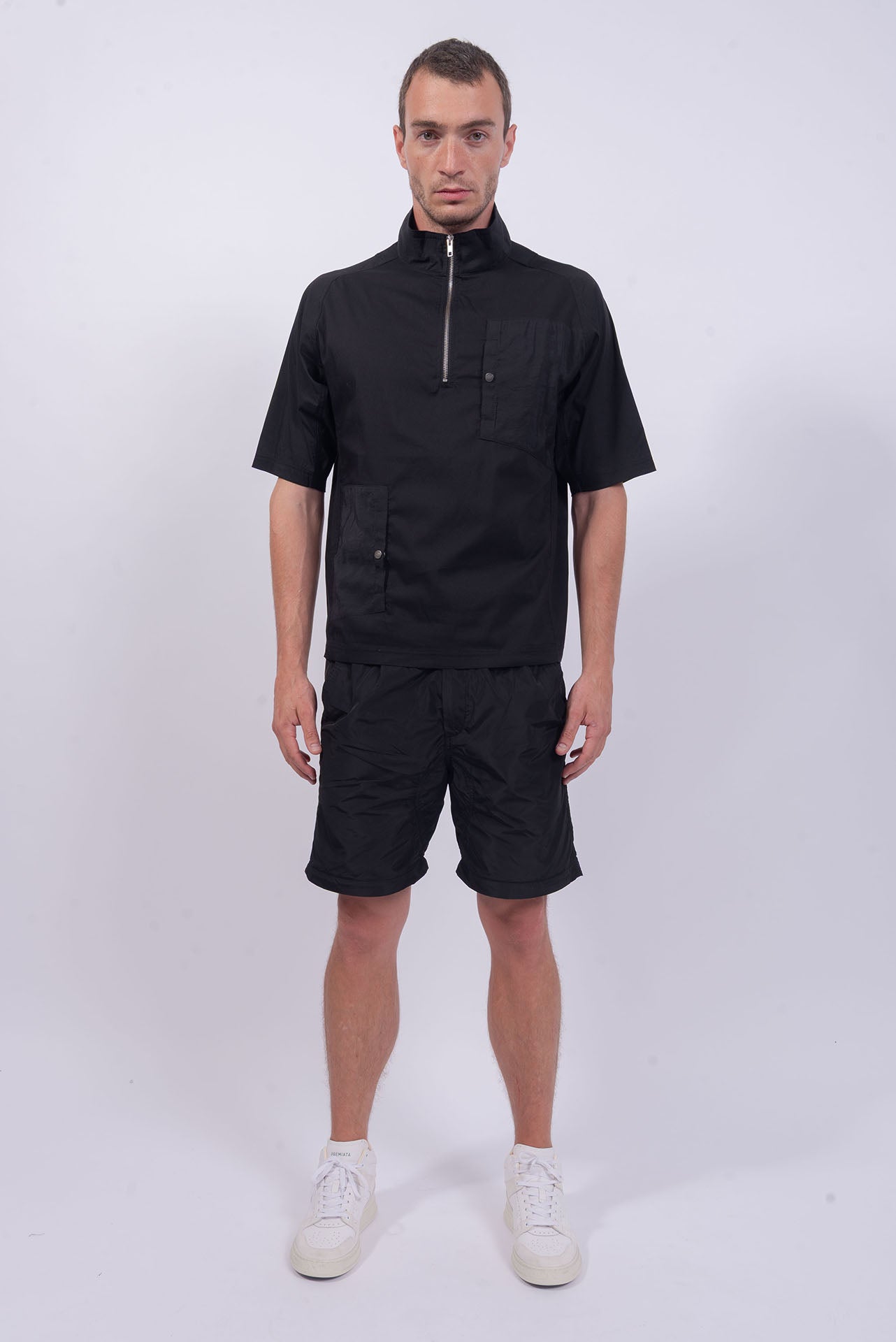 Luda - Pockets  T-Shirt