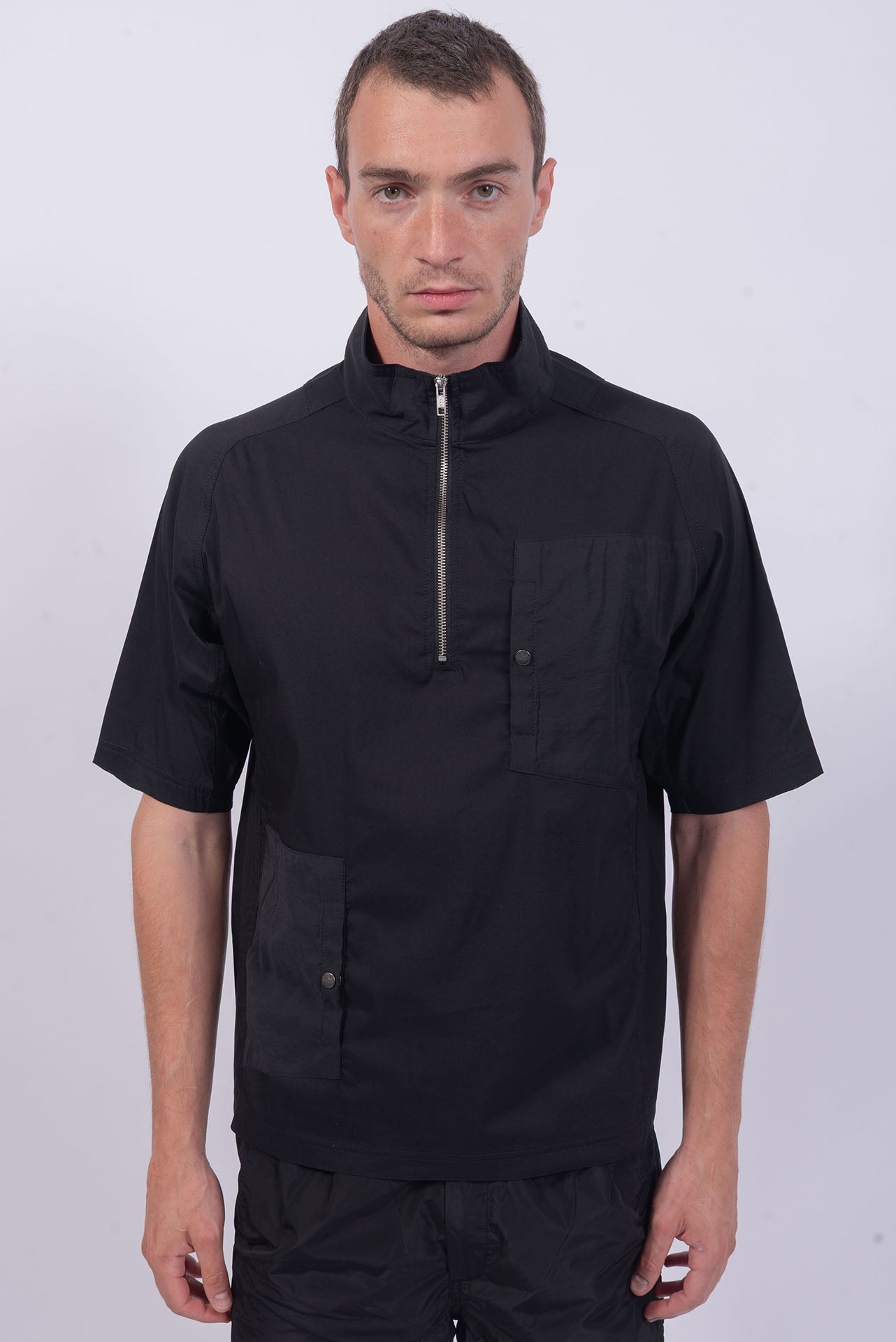 Luda - Pockets  T-Shirt